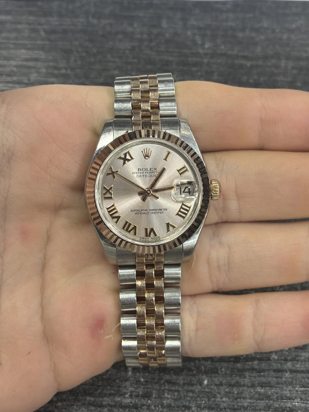 May be an image of wrist watch