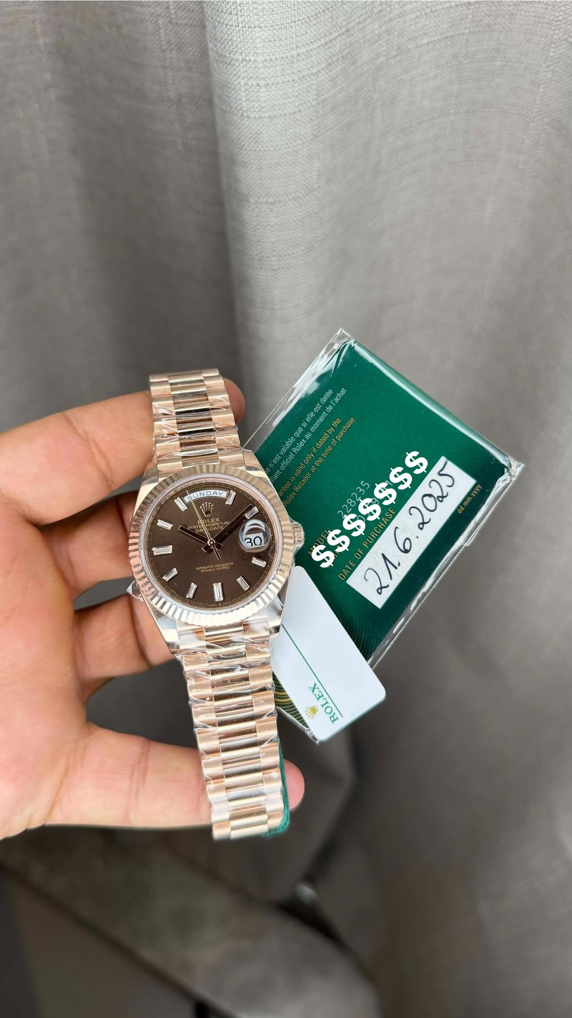 May be an image of wrist watch and text