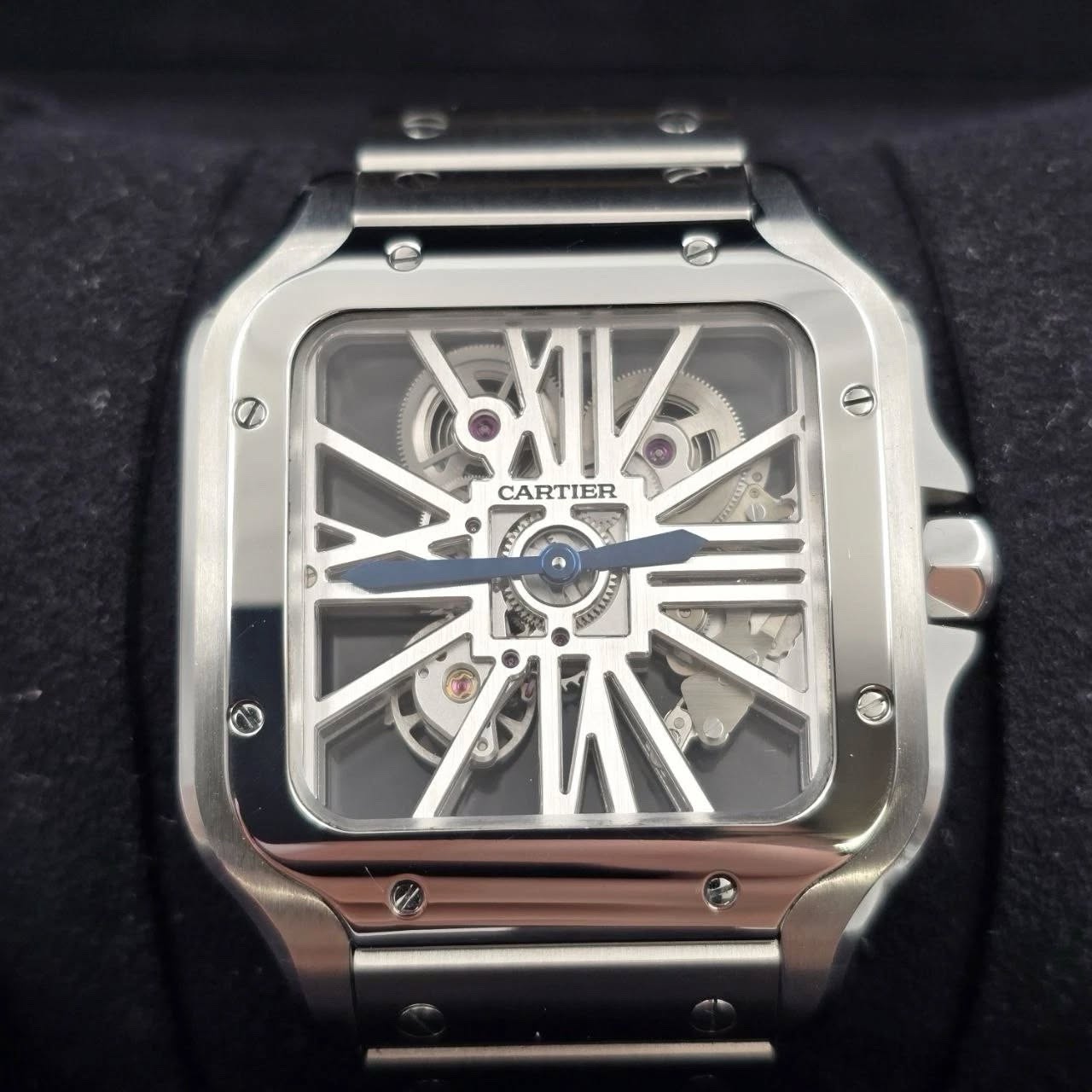 May be an image of wrist watch and text