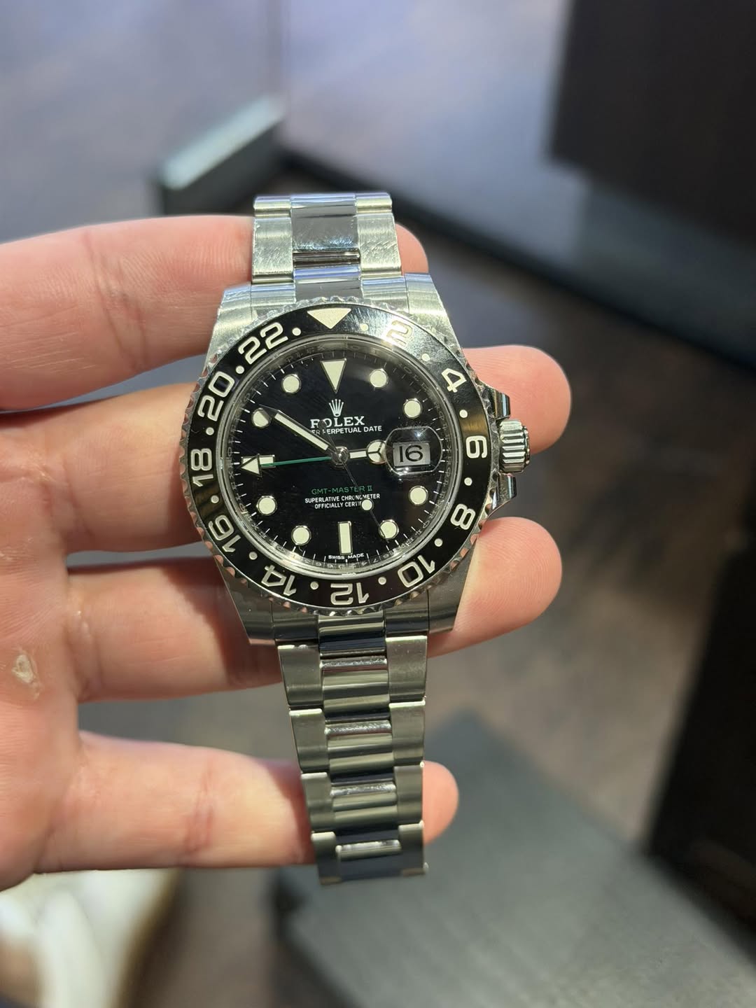 May be an image of wrist watch and text