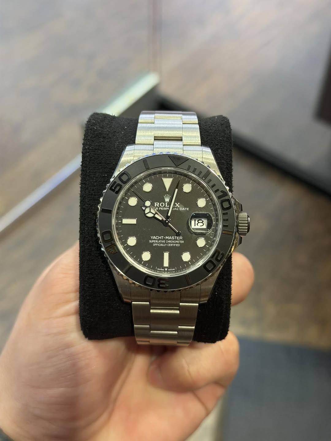 May be an image of wrist watch and text