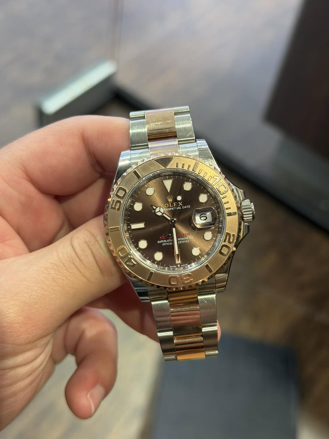 May be an image of wrist watch and text