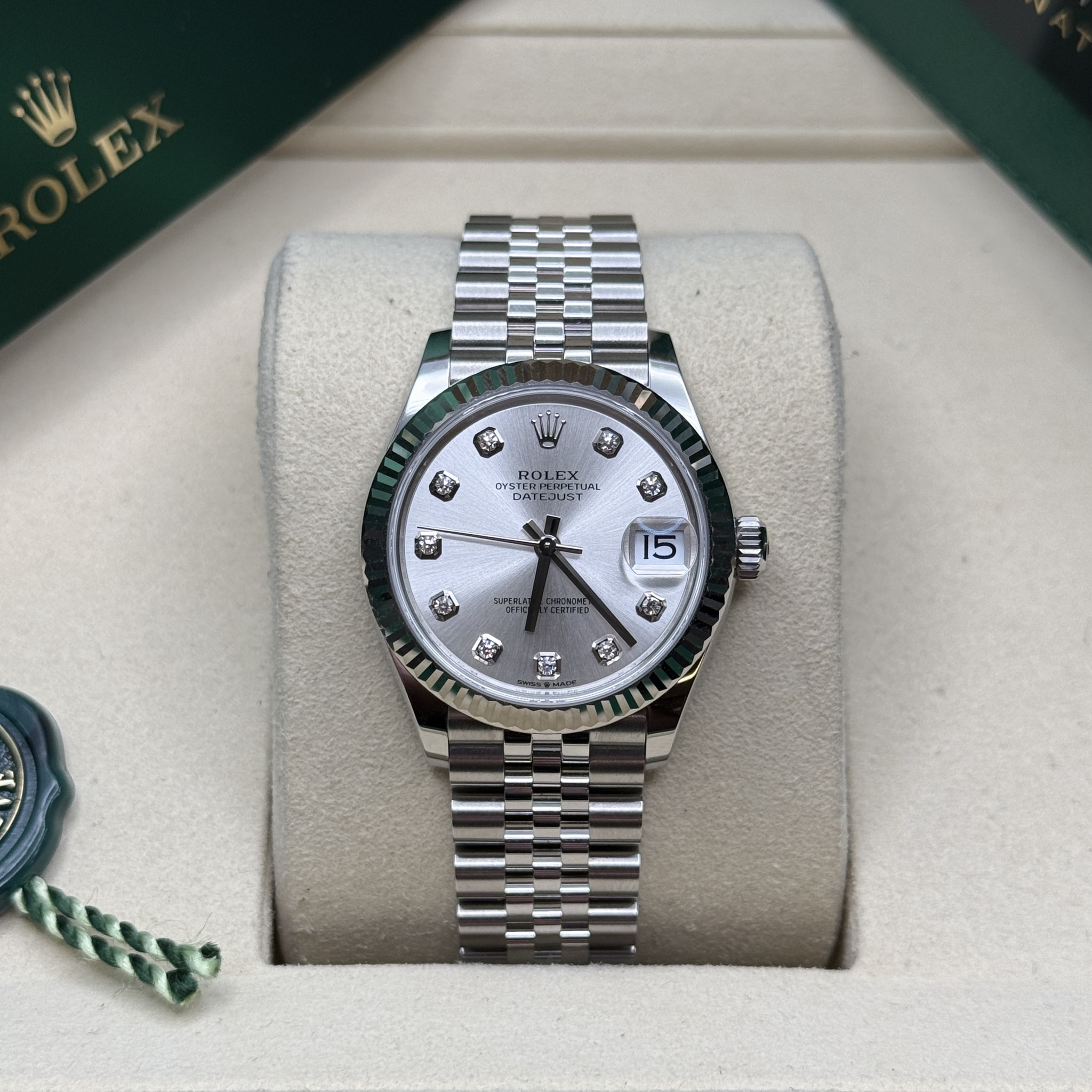 May be an image of wrist watch and text
