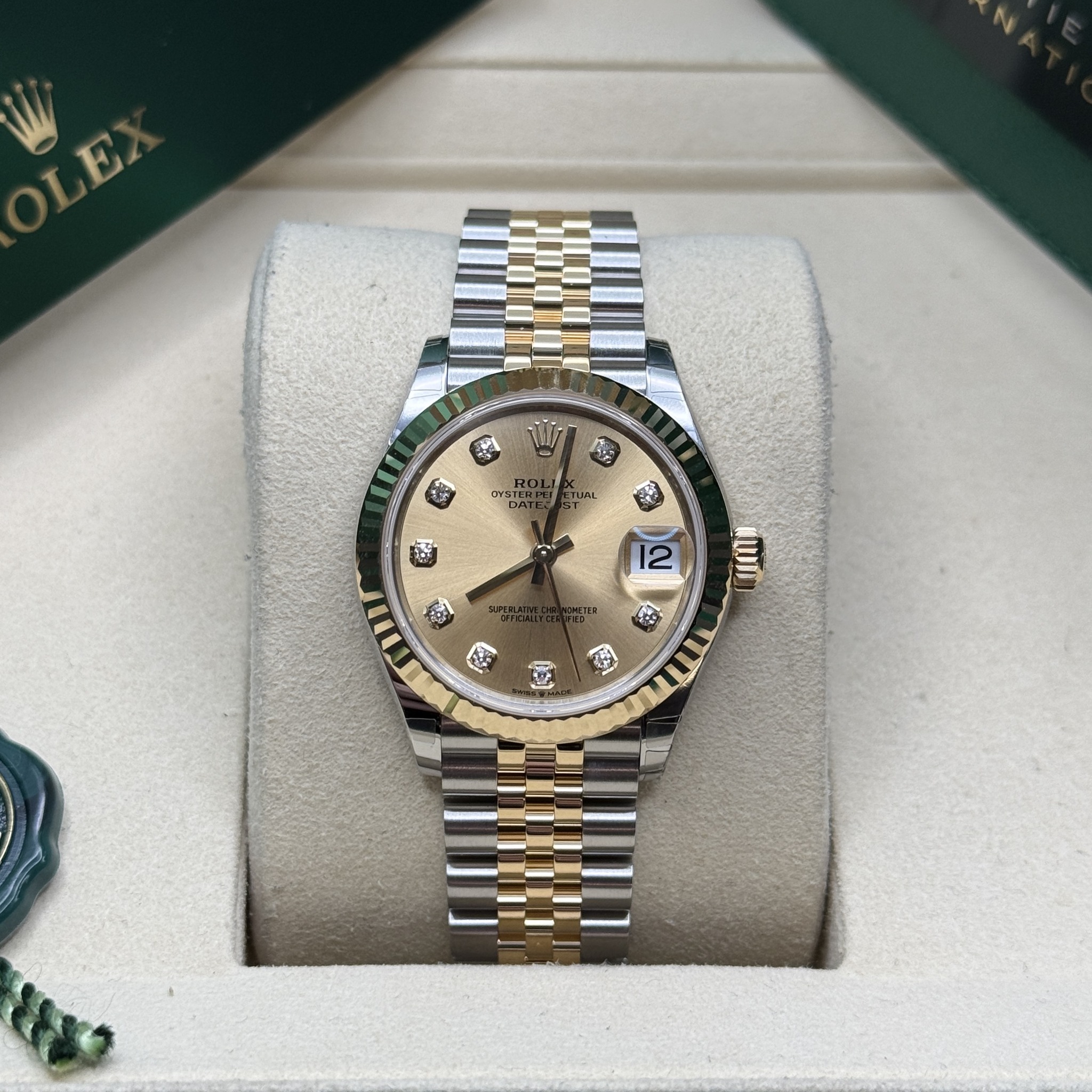 May be an image of wrist watch and text