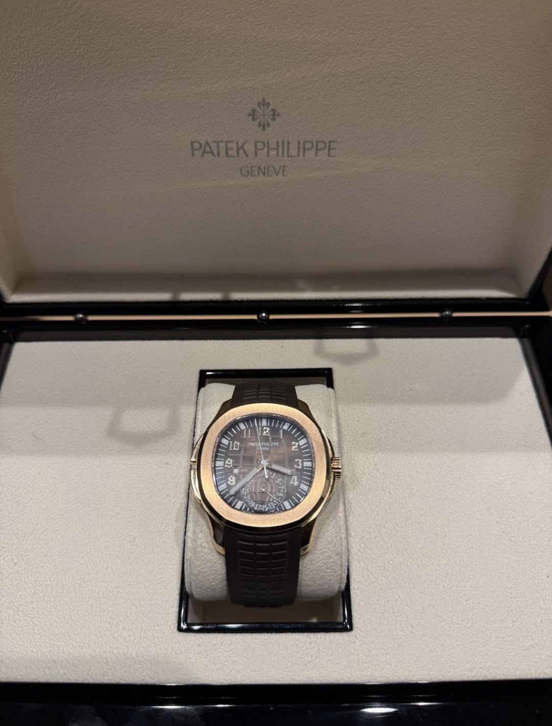 May be an image of wrist watch and text