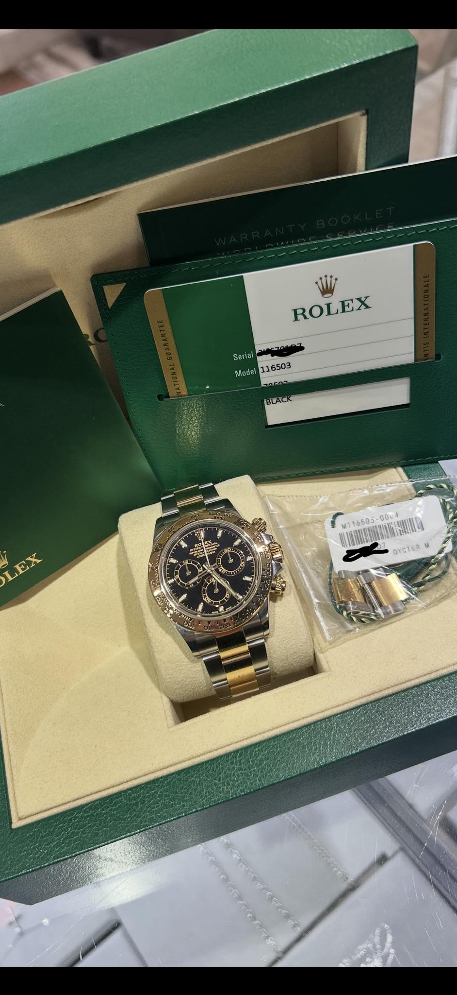 May be an image of wrist watch and text