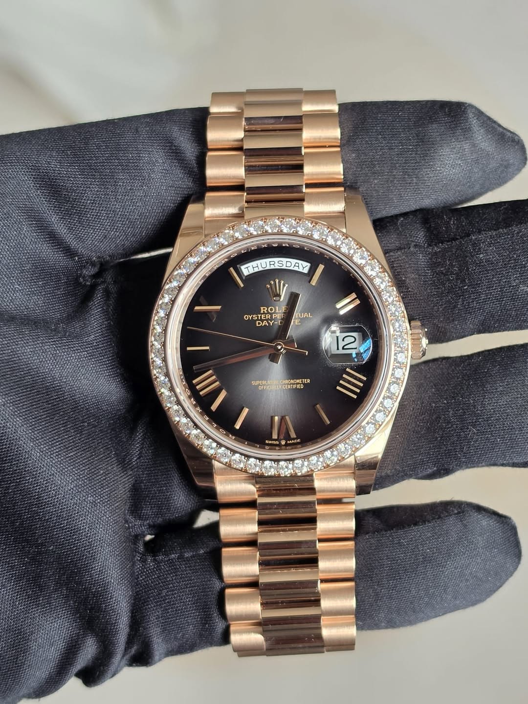 May be an image of wrist watch and text