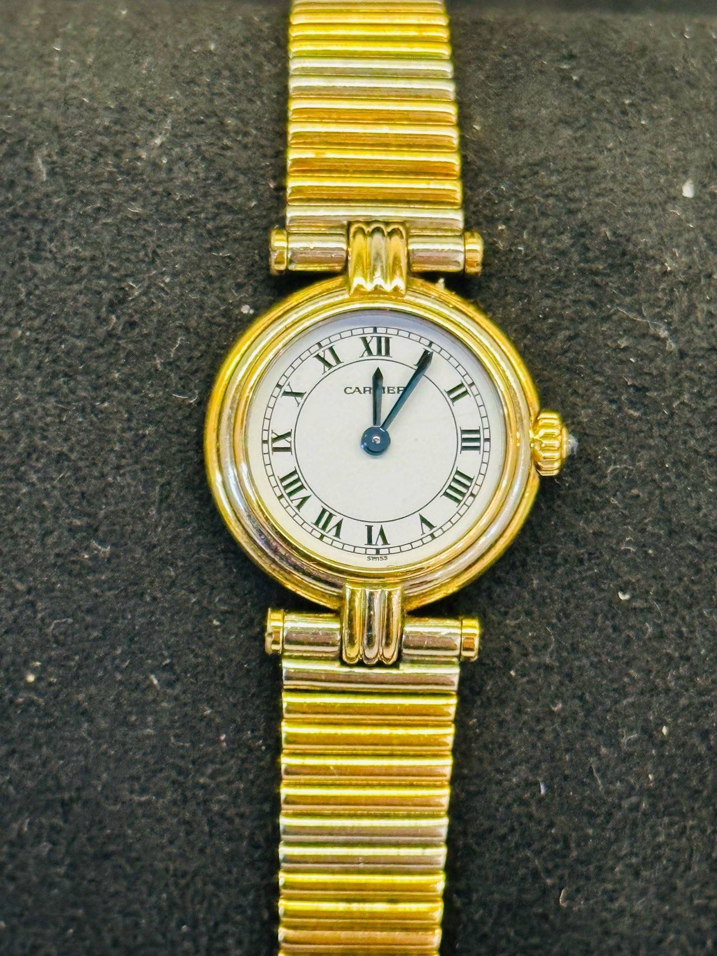 May be an image of wrist watch and text that says 'XII CAR EF II (ാ III VIII VIII VI'