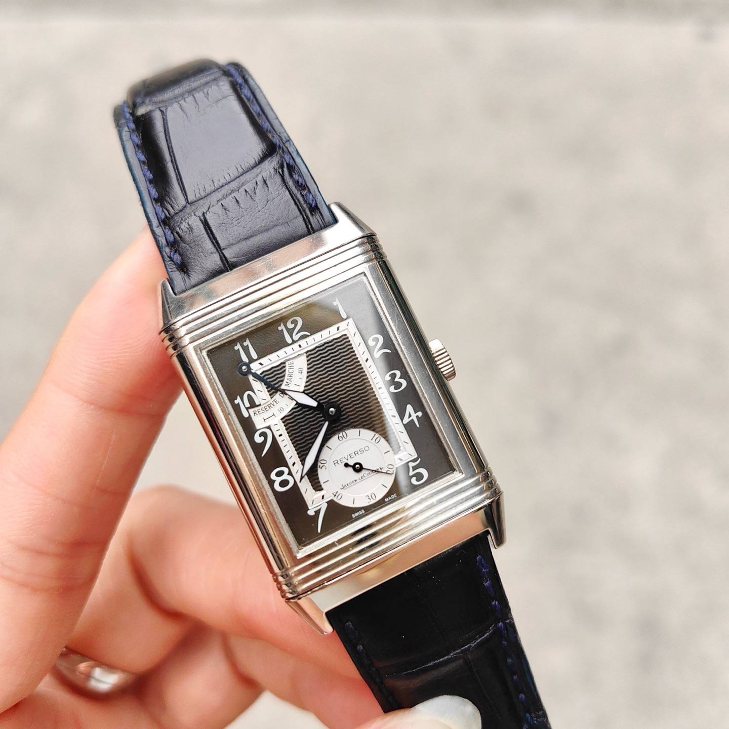 May be an image of digital watch and text