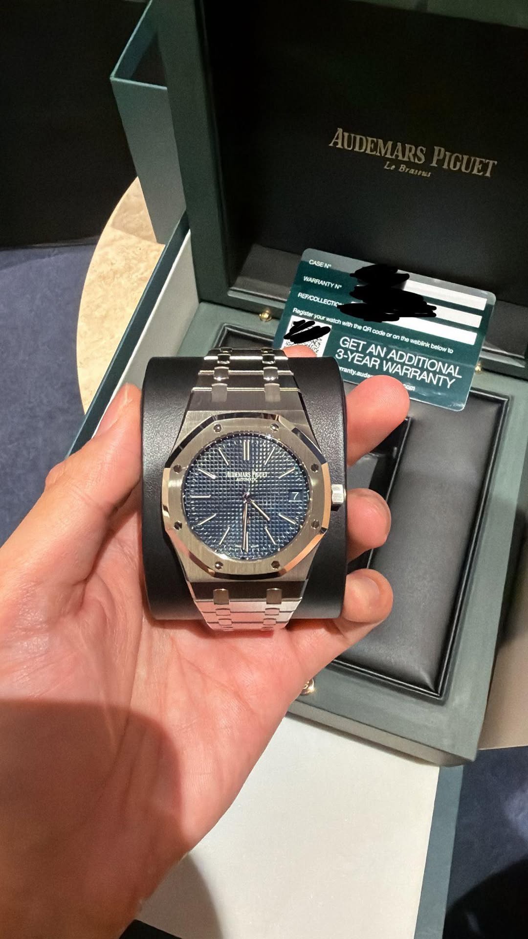May be an image of wrist watch and text