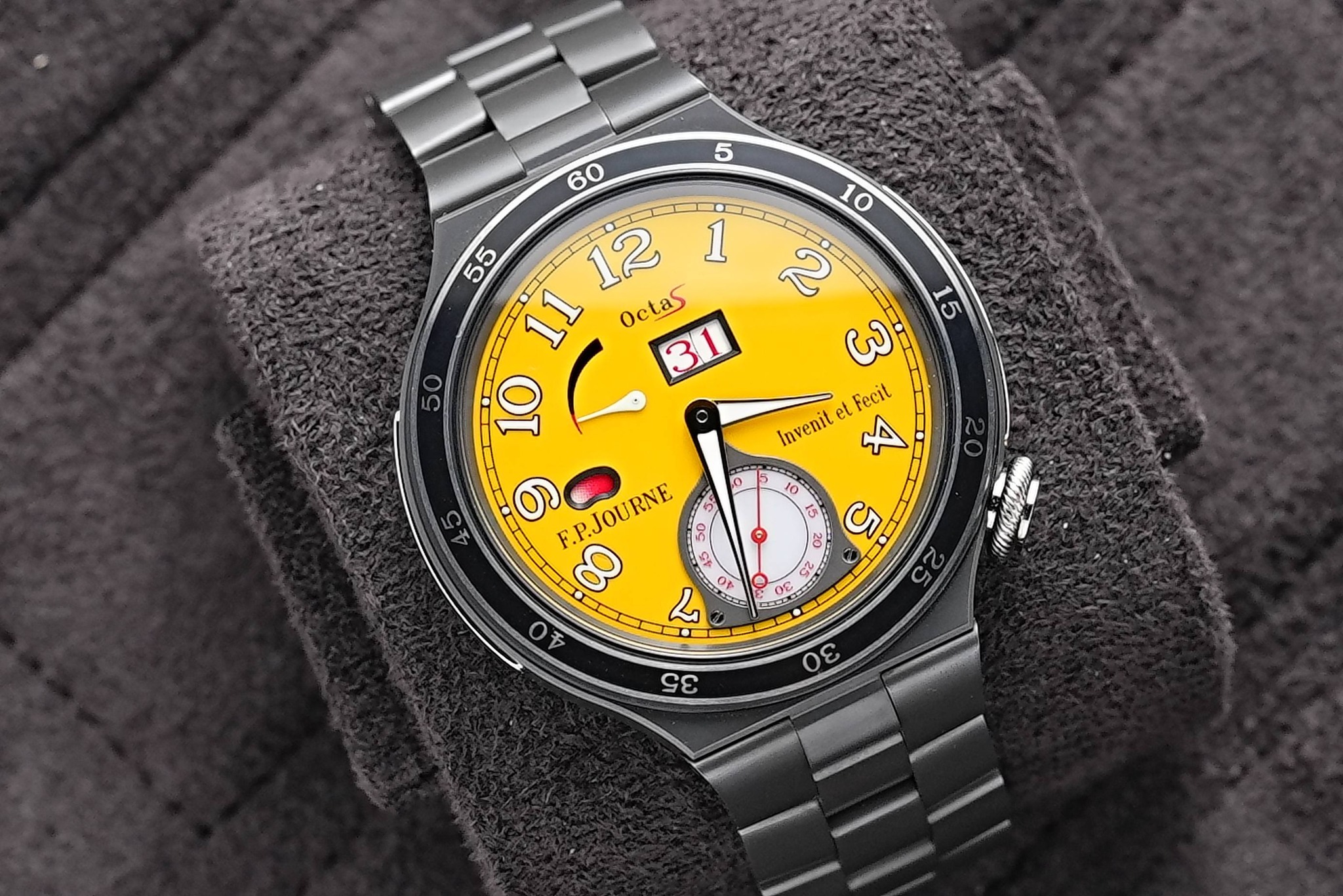 May be pop art of digital watch and text that says ' Octas 2 11 31 બ 10 Fecit invenit et t A 9 F.P.JOURNE 50 00 2 Lo ራ KE ቼ 2 G G S 20 C 6 5 N ቦና Ον οε C'
