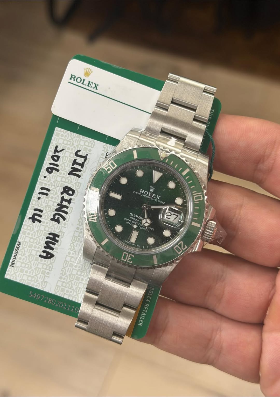 May be an image of wrist watch and text