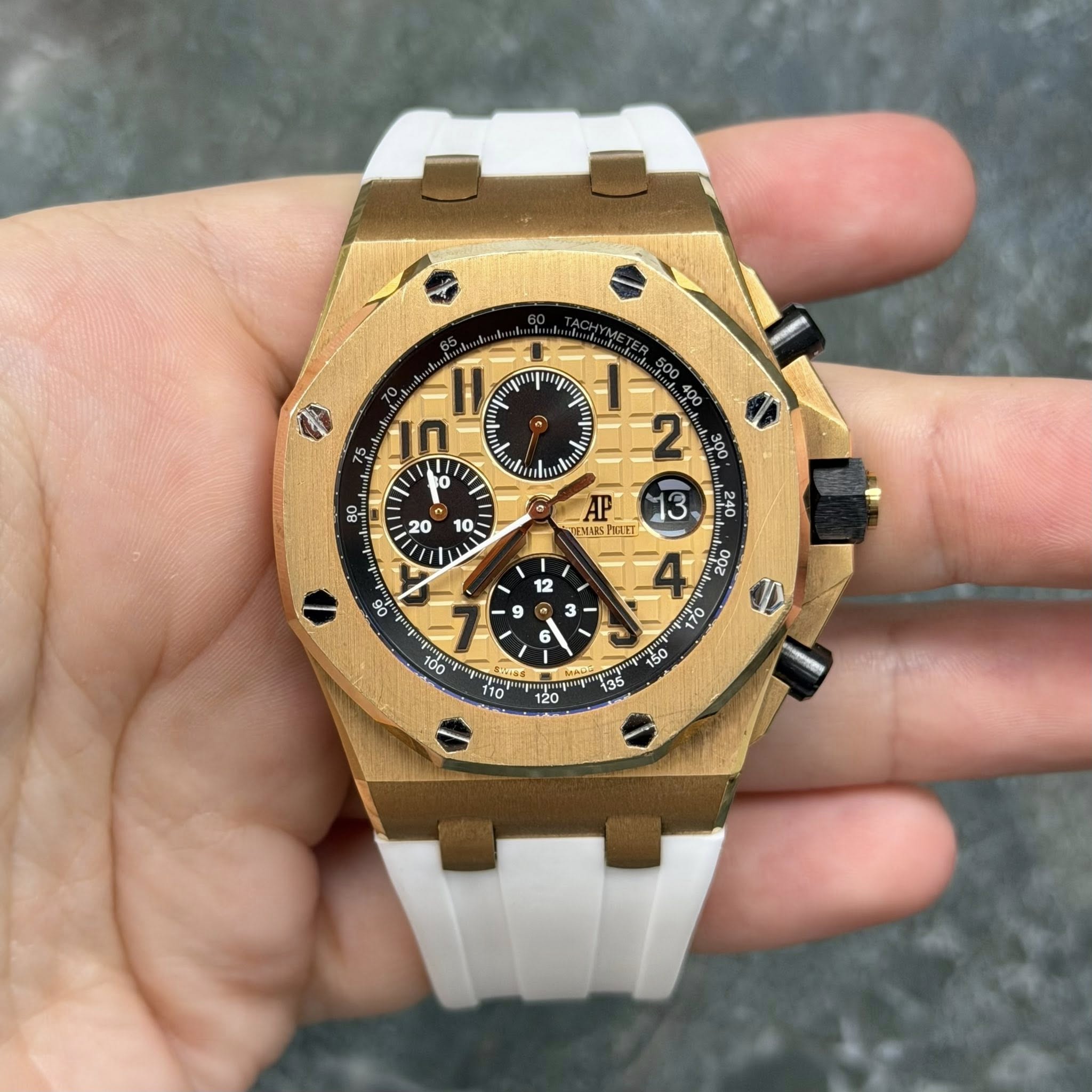 May be an image of wrist watch and text