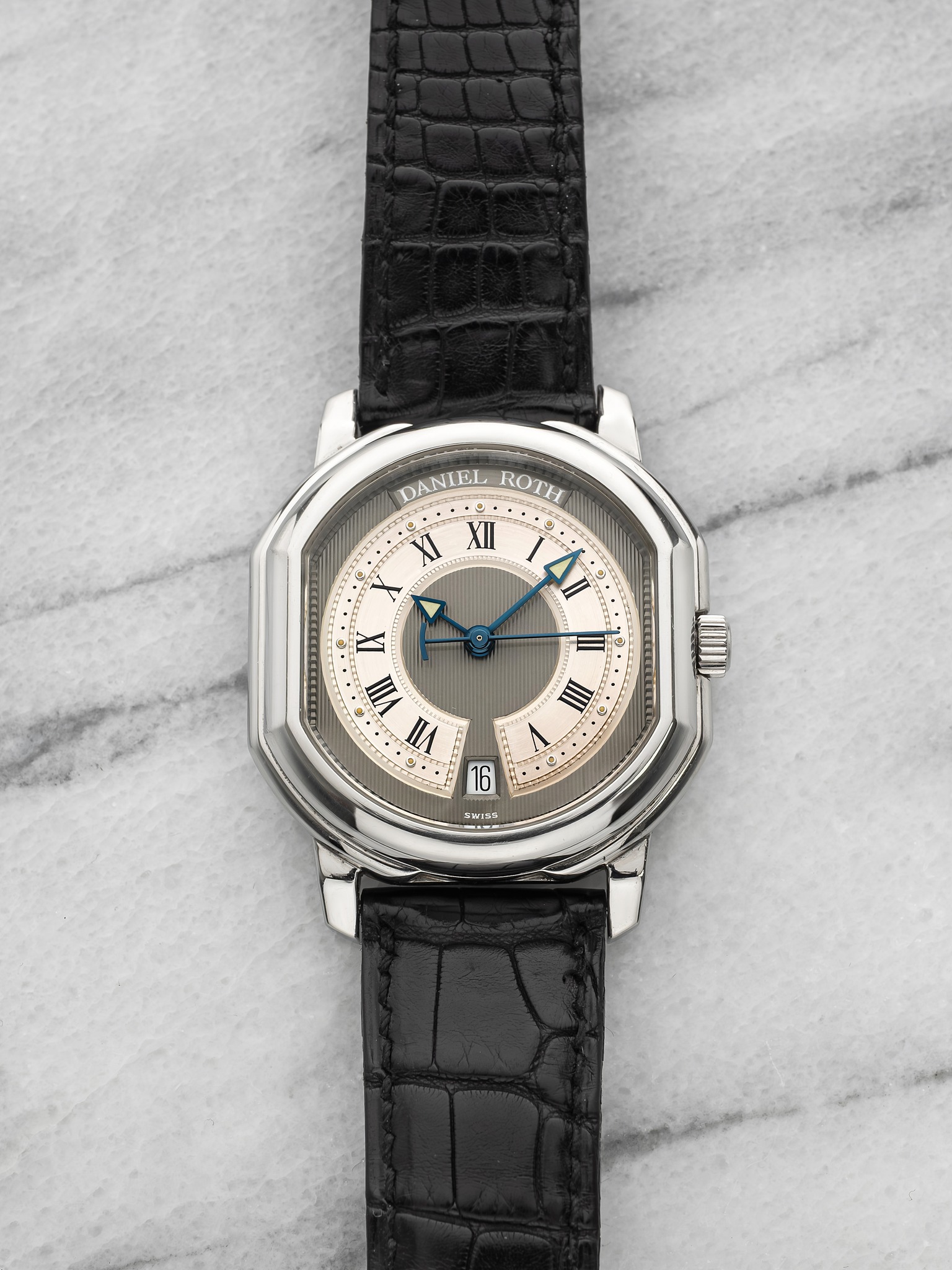 May be an image of wrist watch and text