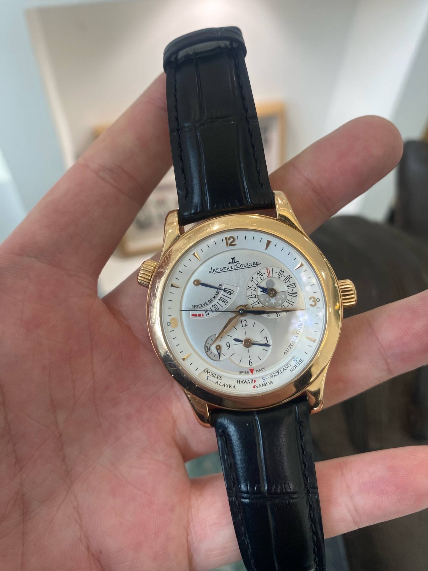 May be an image of wrist watch and text