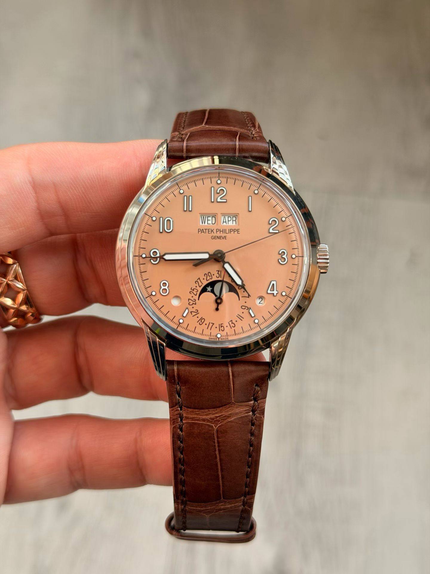 May be an image of wrist watch and text