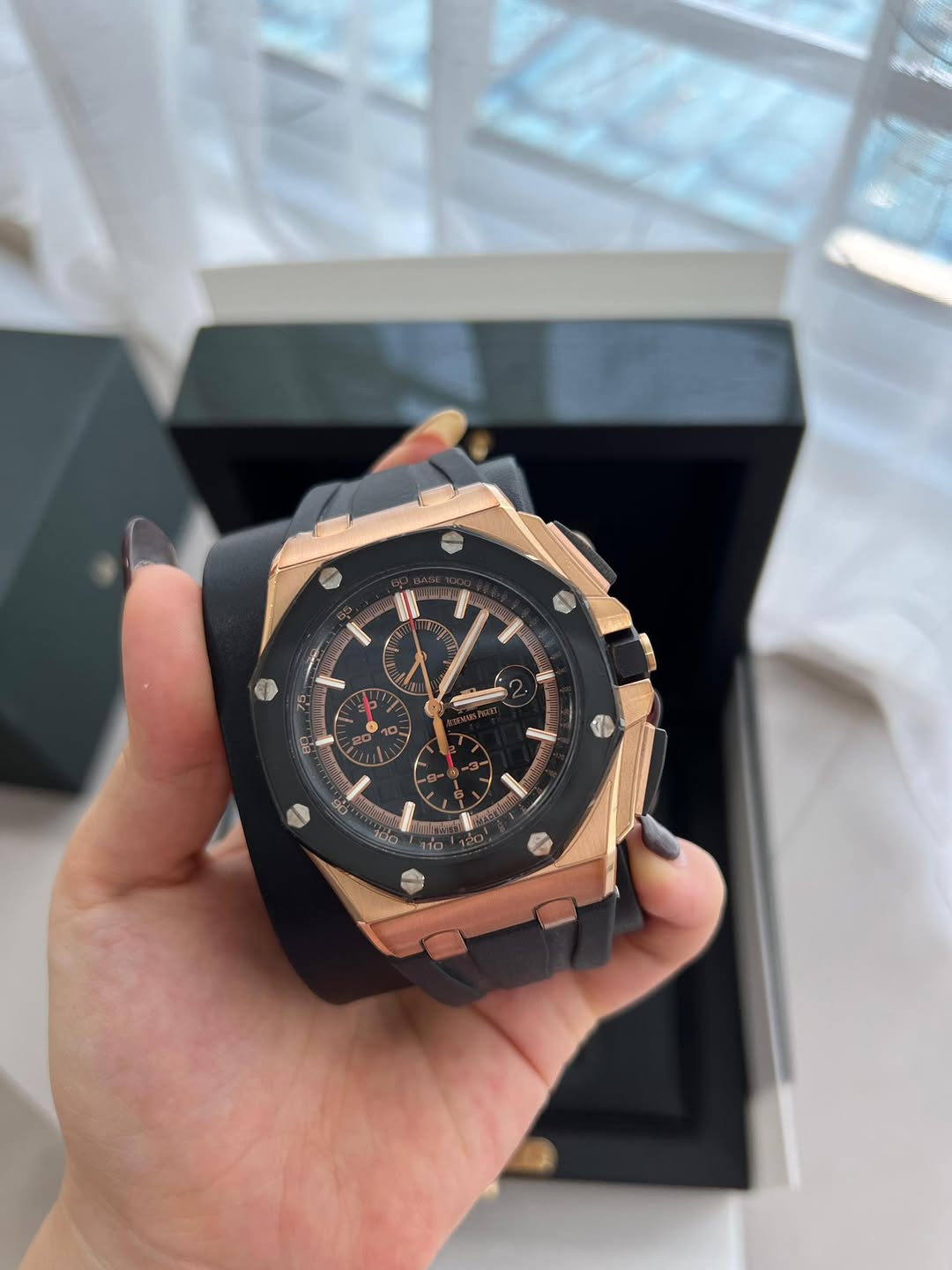 May be an image of wrist watch and text