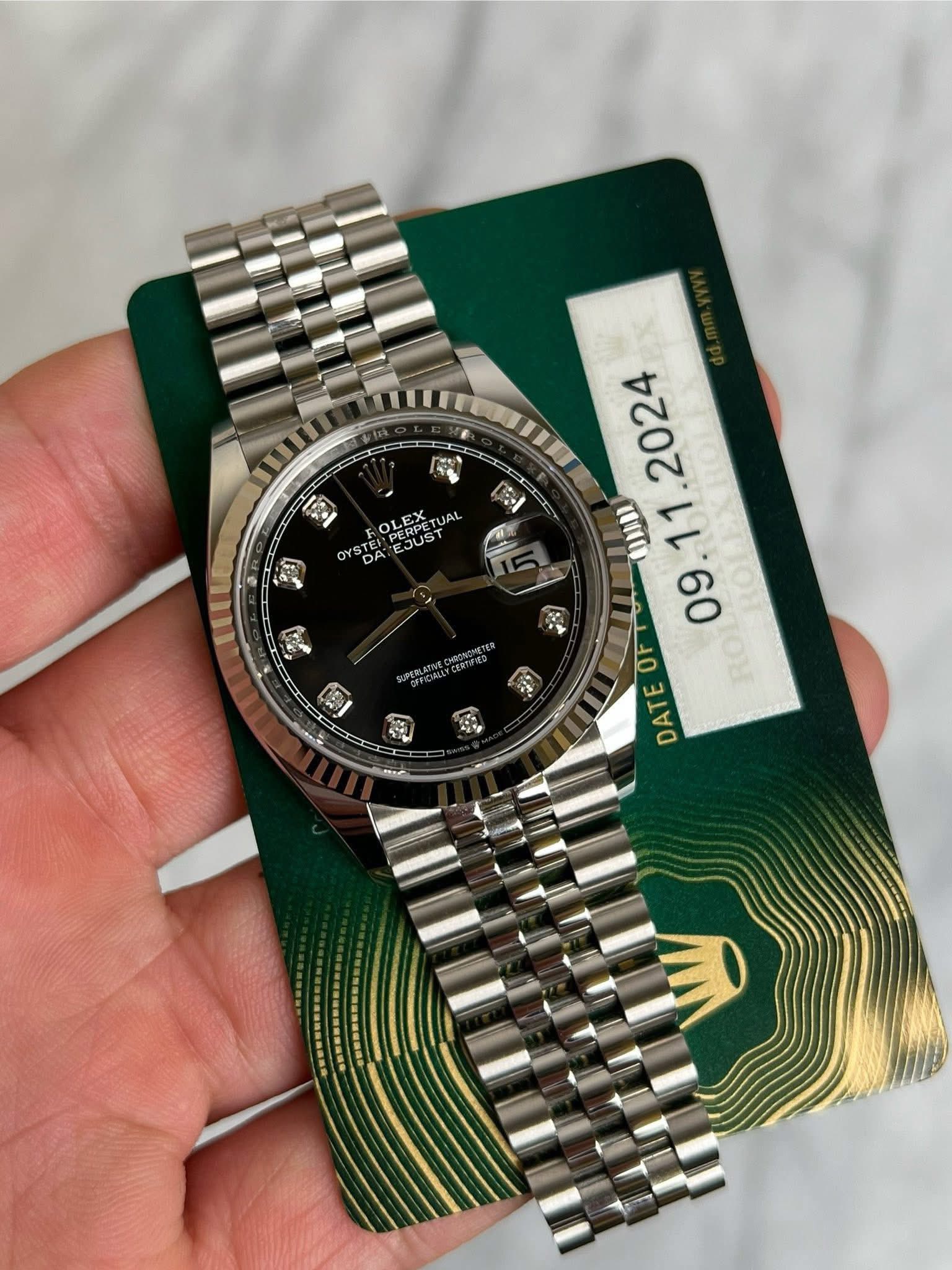 May be an image of wrist watch and text that says 'و OL sTE DA TEI PERPEL PERPET EX Ελ TUAL EJUST DA 油 前 . ORB 09 DATE E DATE OF H'