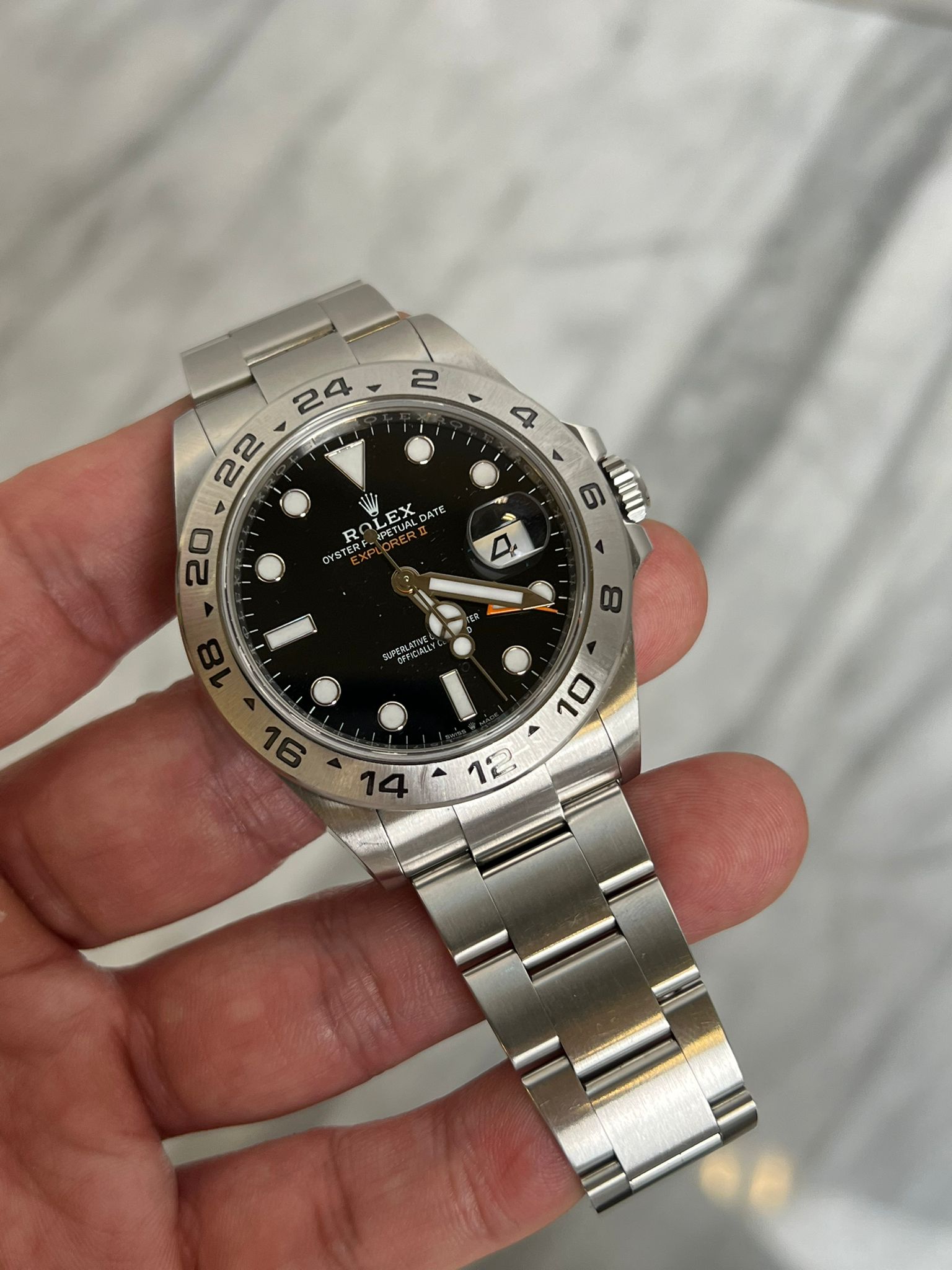 May be an image of wrist watch and text