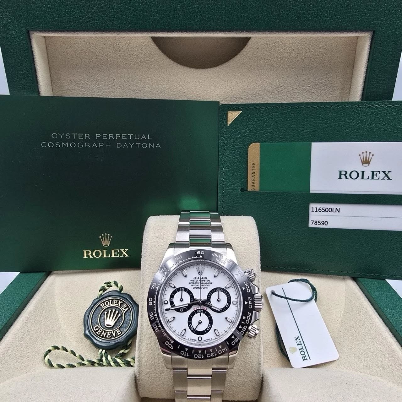 May be an image of wrist watch and text that says 'OYSTERPERPETUAL OYSTER PERP UAL COSMOGRAPHDAYTONA COSMOGRAP DAYTONA UARANTEE ROLEX 116500LN ROLEX 78590 GO UNECO PUT ב.. ポ )…