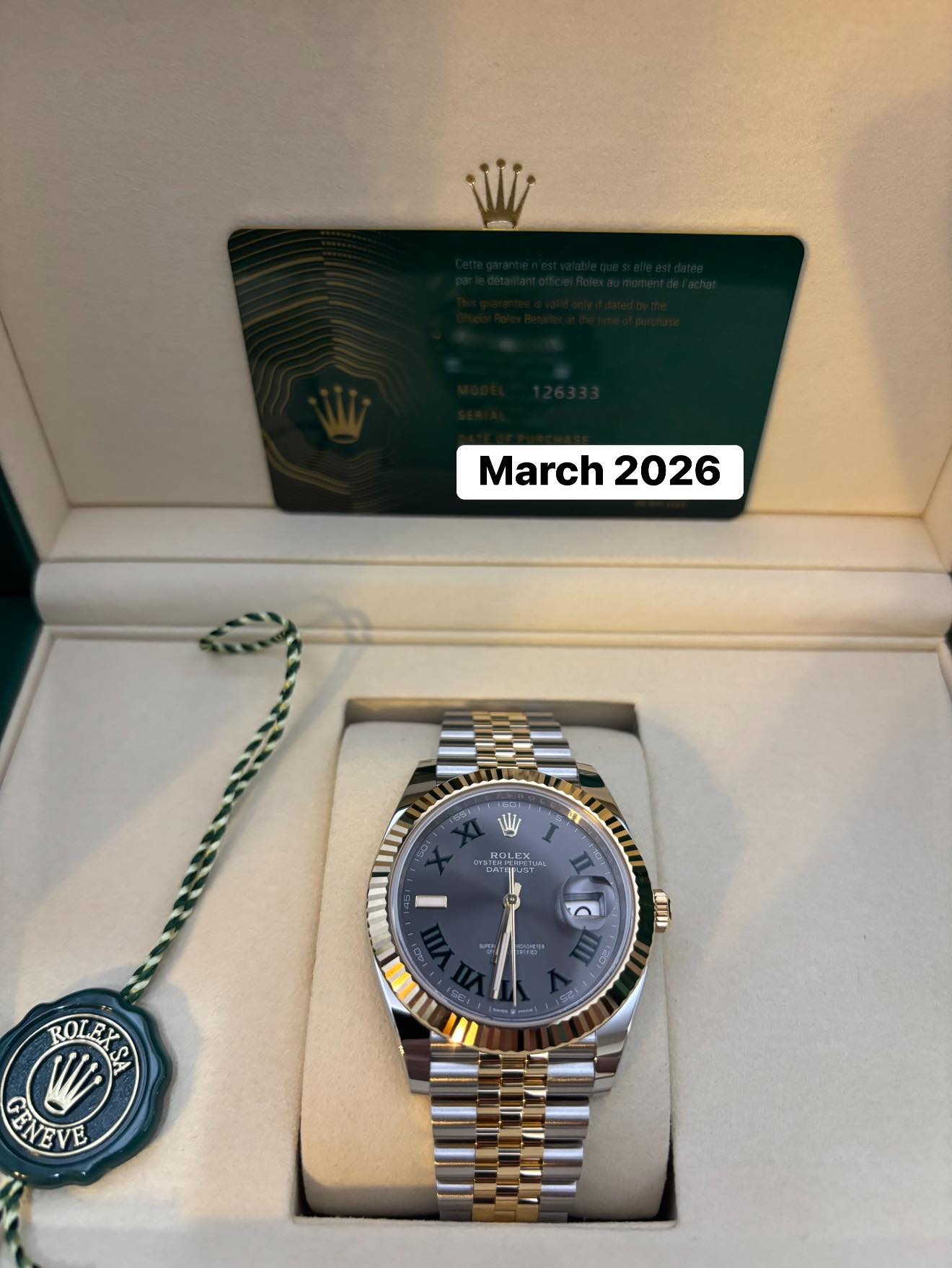 May be an image of wrist watch and text