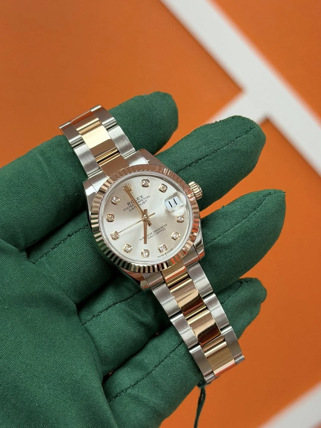 May be an image of wrist watch and text