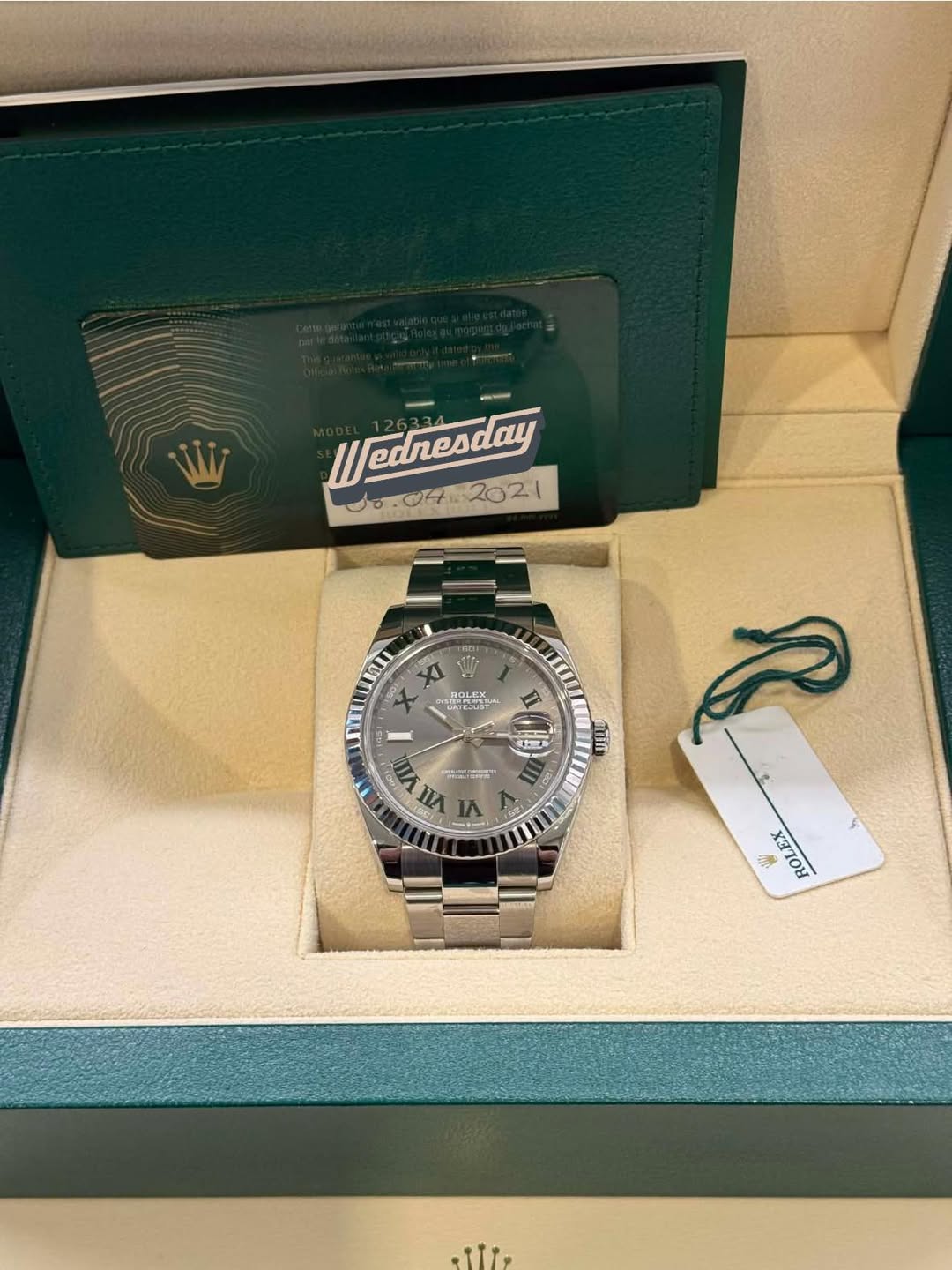 May be an image of wrist watch and text