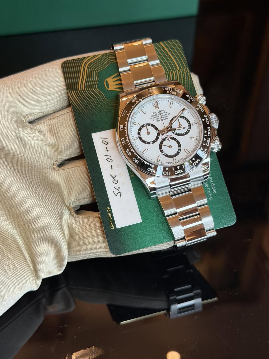 May be an image of wrist watch and text