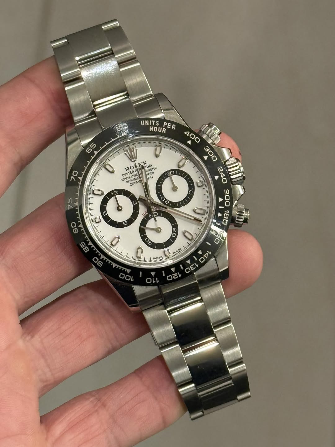 May be an image of wrist watch and text