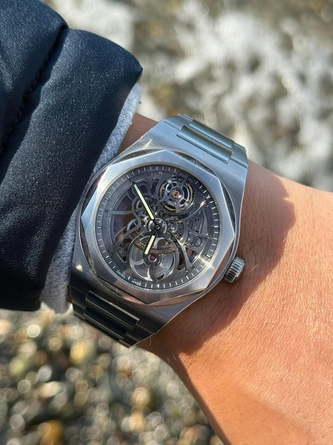 May be an image of wrist watch and text