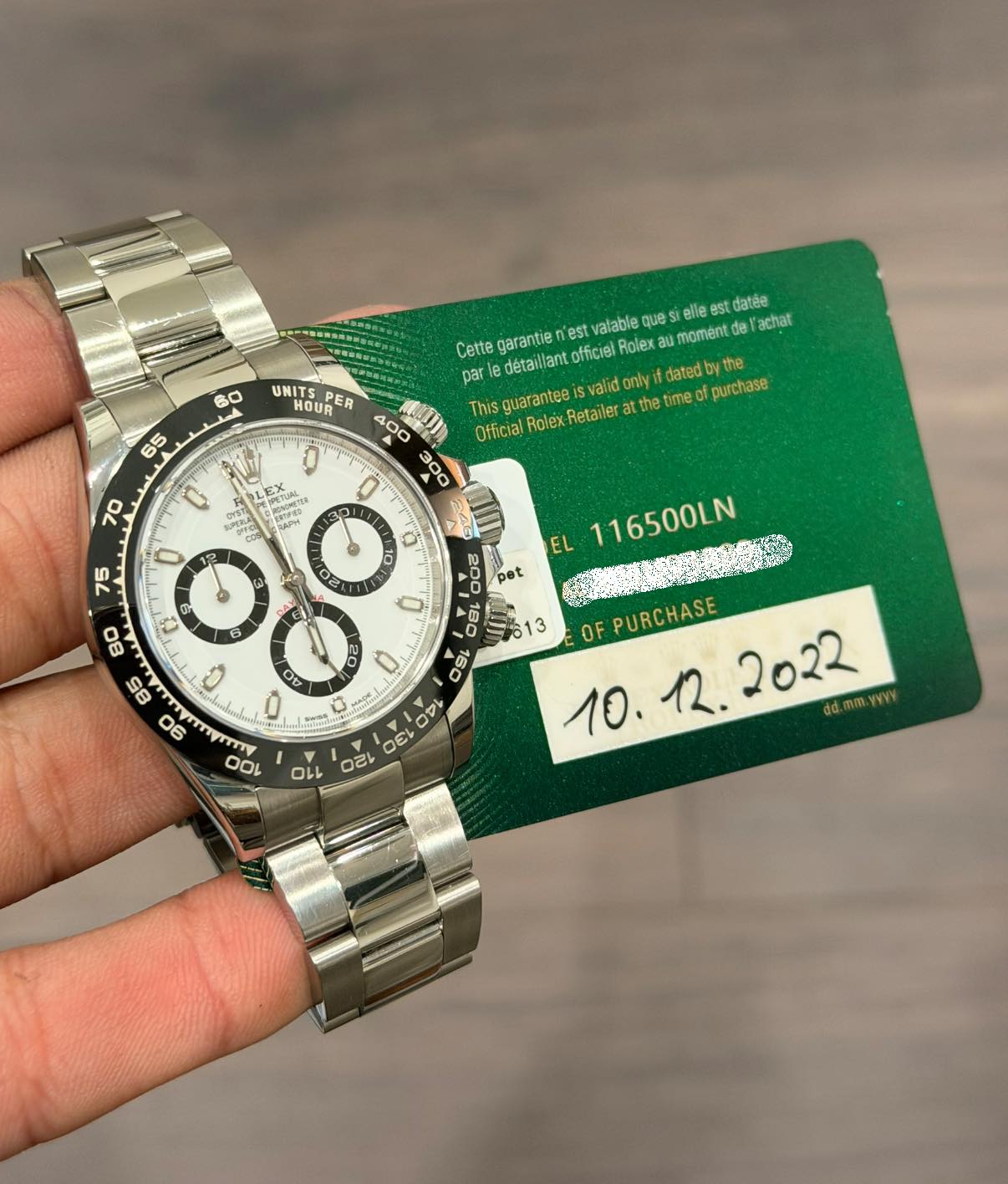 May be an image of wrist watch and text that says '60 65 elle lee est datée achat Cette garantie est vafable que officiel Rolex moment par UNITS HOUR PER 400 This guarantee…