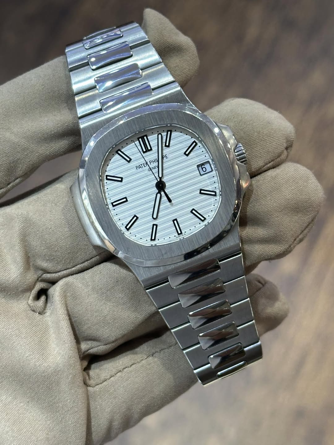 May be an image of wrist watch and text