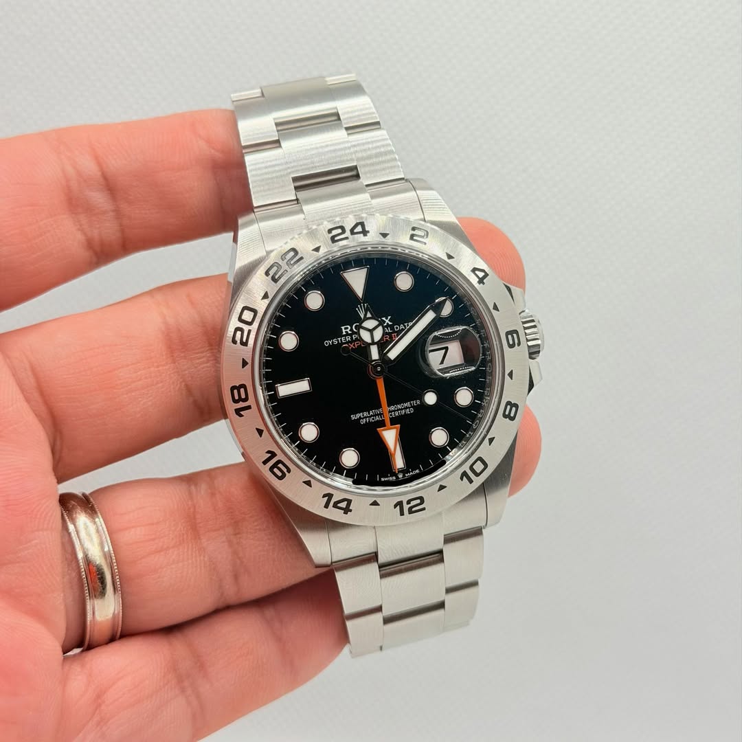 May be an image of wrist watch and text