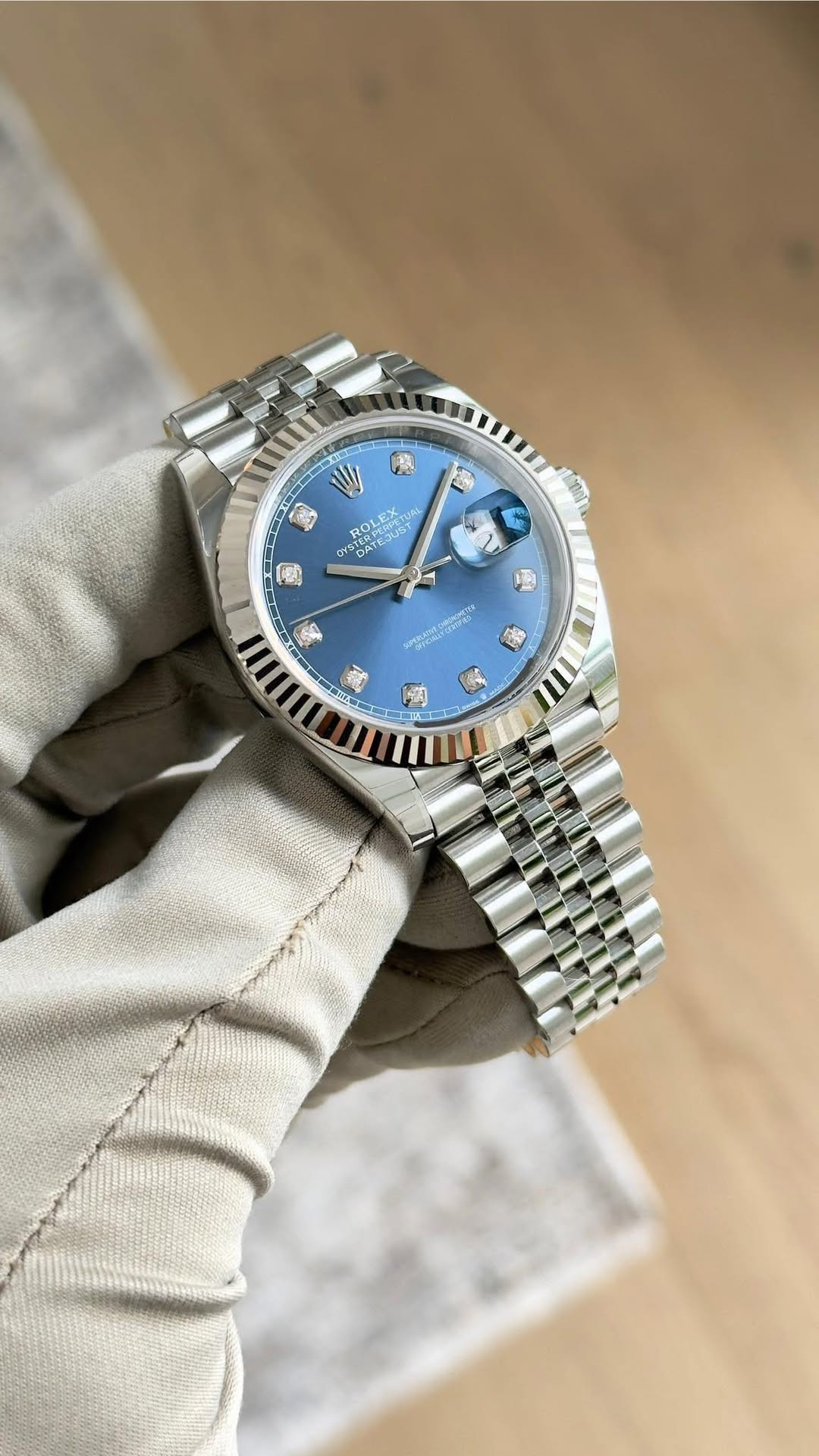 May be an image of wrist watch and text