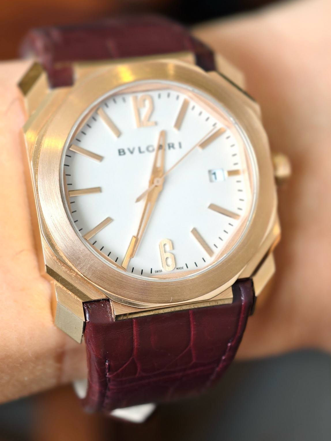 May be an image of wrist watch and text that says '2 BVLGARI BVLOARI RI ក្រក 6.1... ារ់ 6 MAAE'