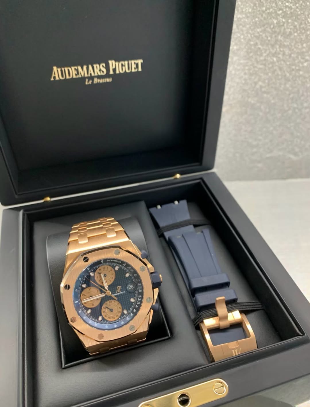 May be an image of wrist watch and text
