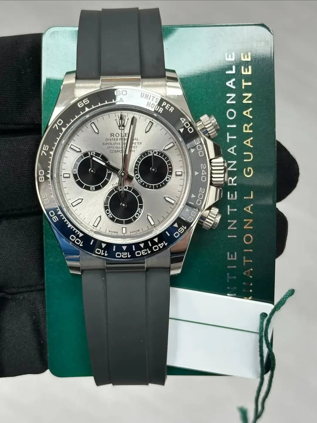 May be an image of wrist watch and text that says '60 A 65 70 OTER ROL UPERLATIVE CFFD AL 75 0 12 COSMO 3 드 80 6 O O จ 10 85 90 E INTERNATIONALE GUARANTEE UNITS মোলোস HOUR ER II…