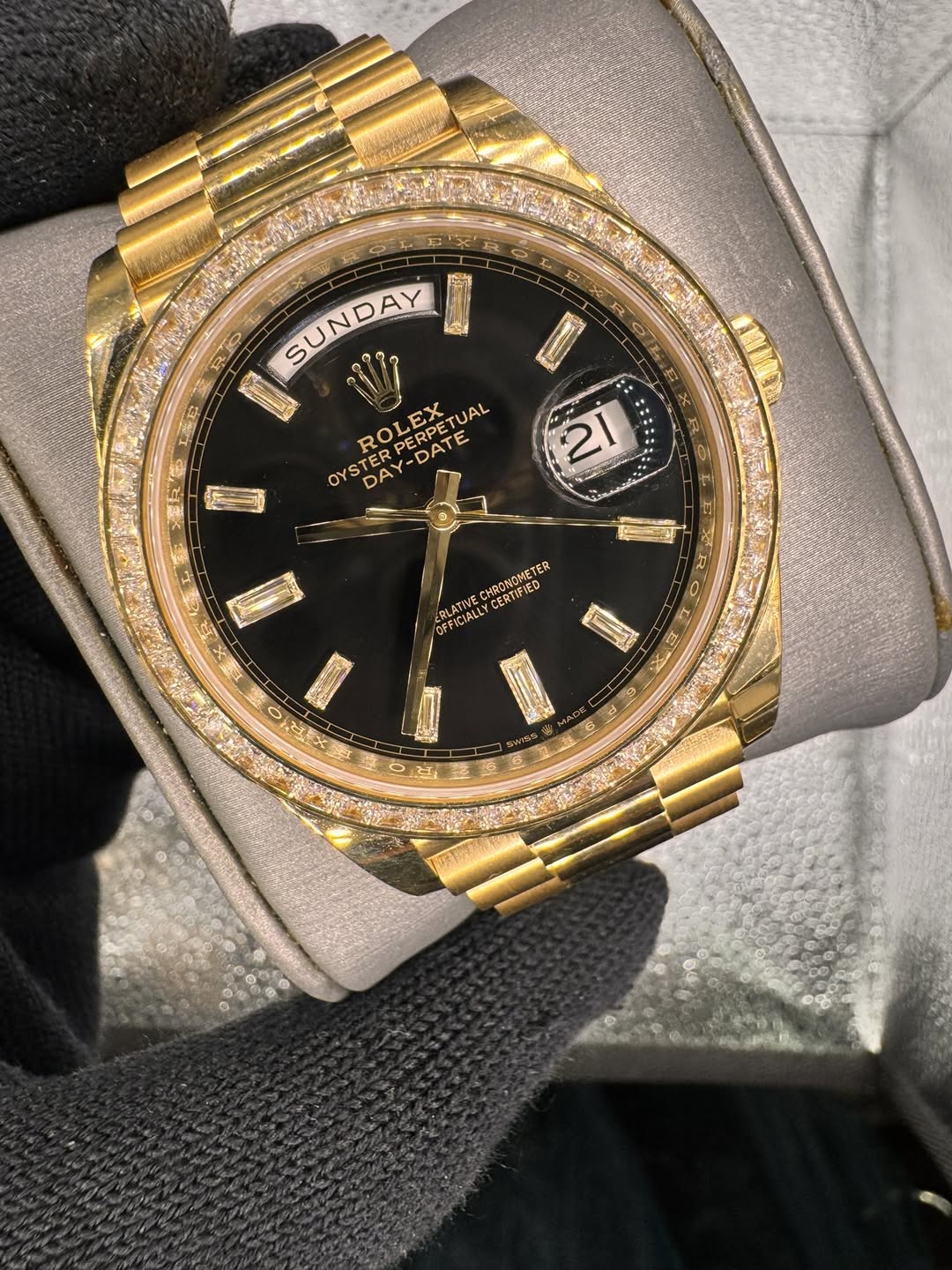 May be an image of wrist watch and text