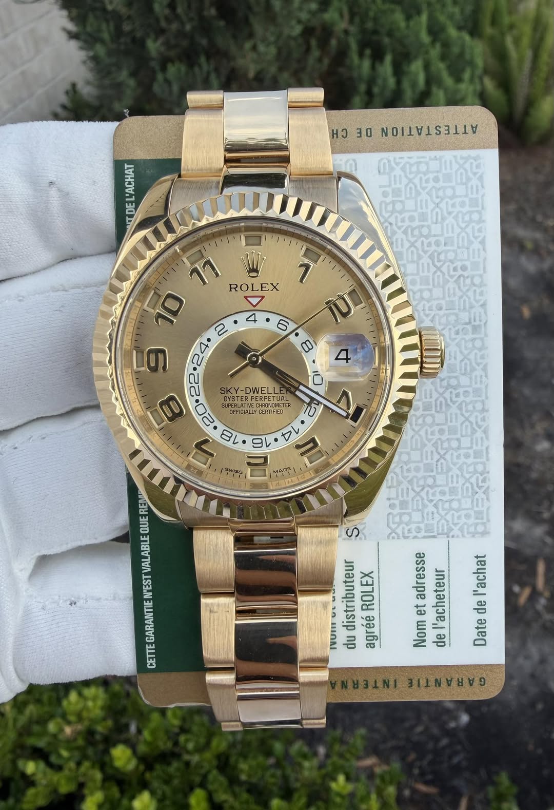 May be an image of wrist watch and text
