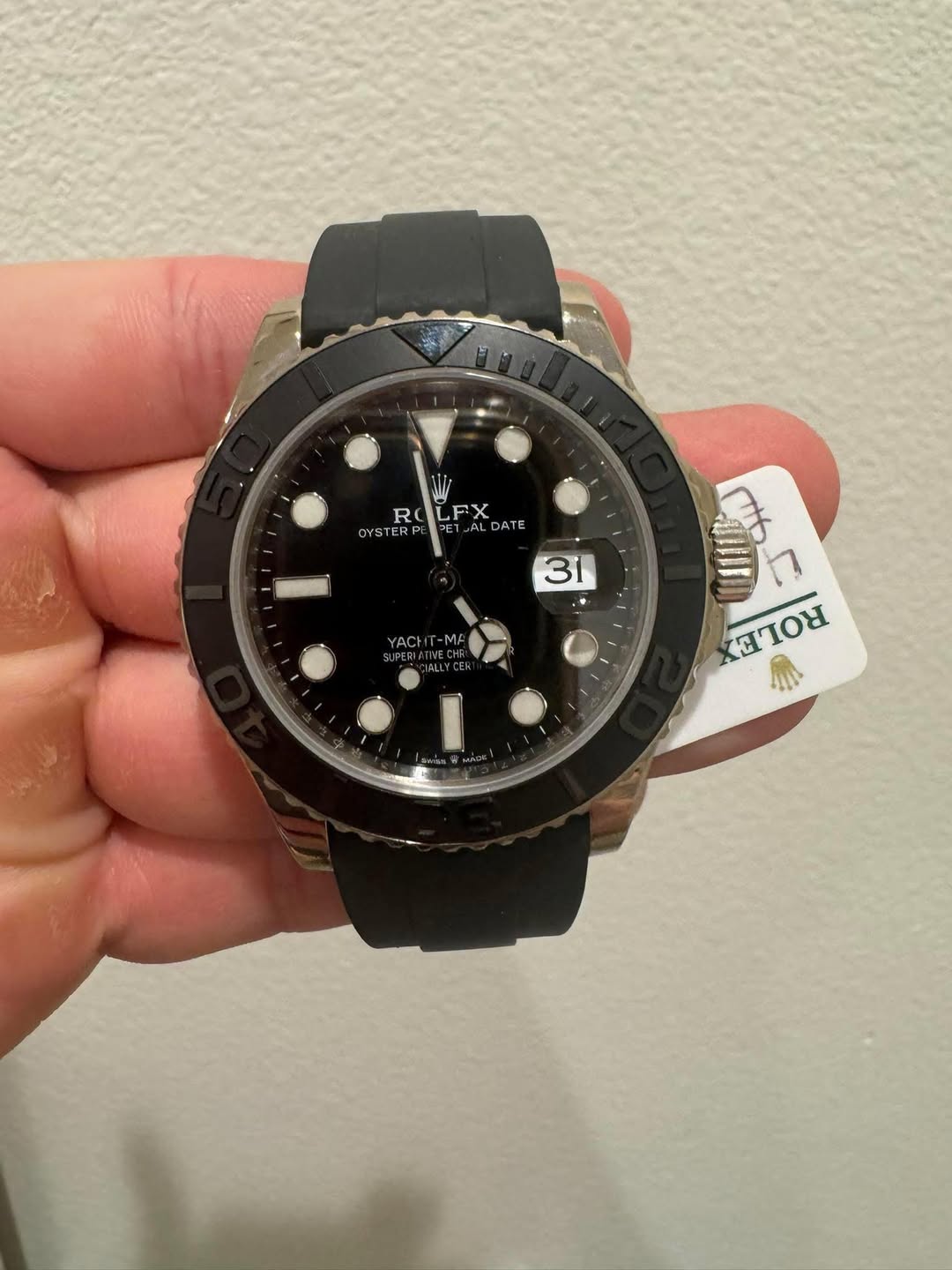 May be an image of wrist watch and text