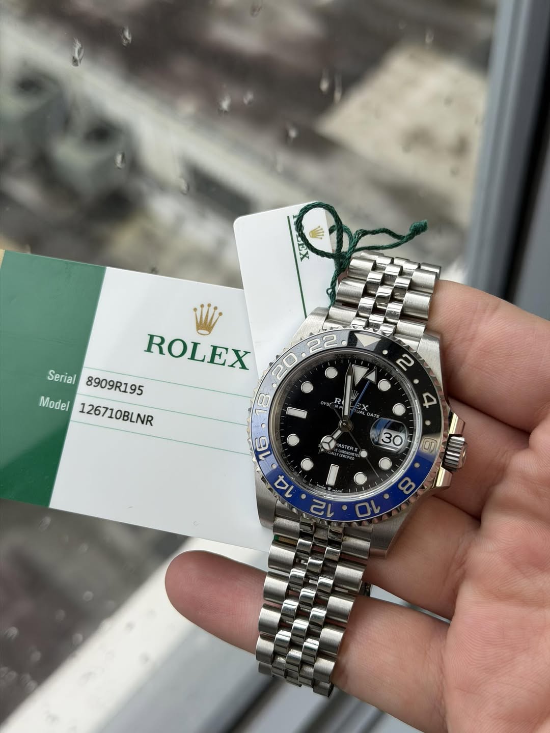 May be an image of wrist watch and text that says 'EX EX ATp ROLEX Serial 8909R195 Model 126710BLNR 126710BLNR 8 R Fe 9 ASTIERE o 2'