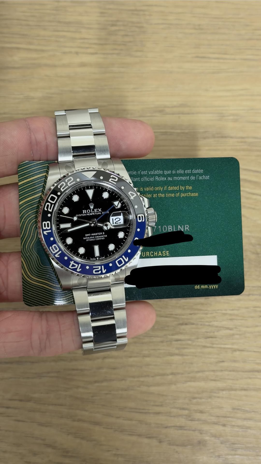 May be an image of wrist watch and text