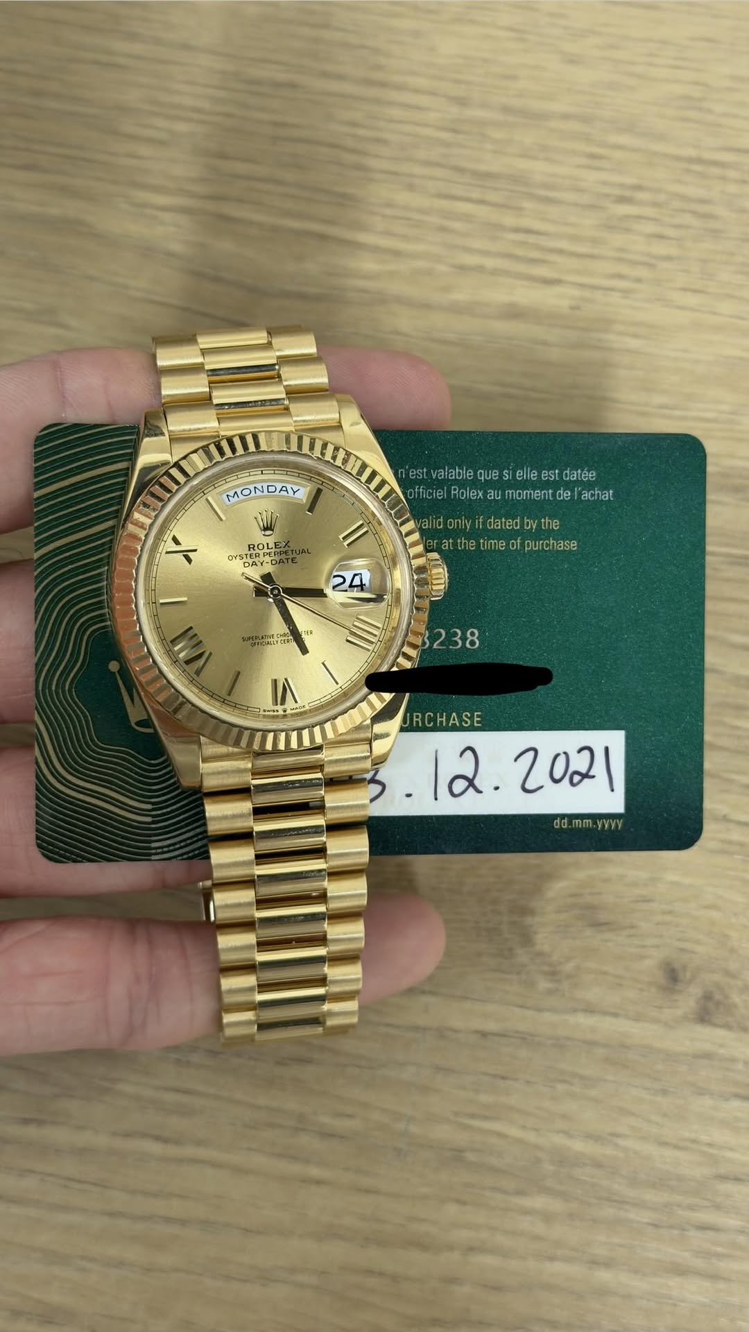 May be an image of wrist watch and text