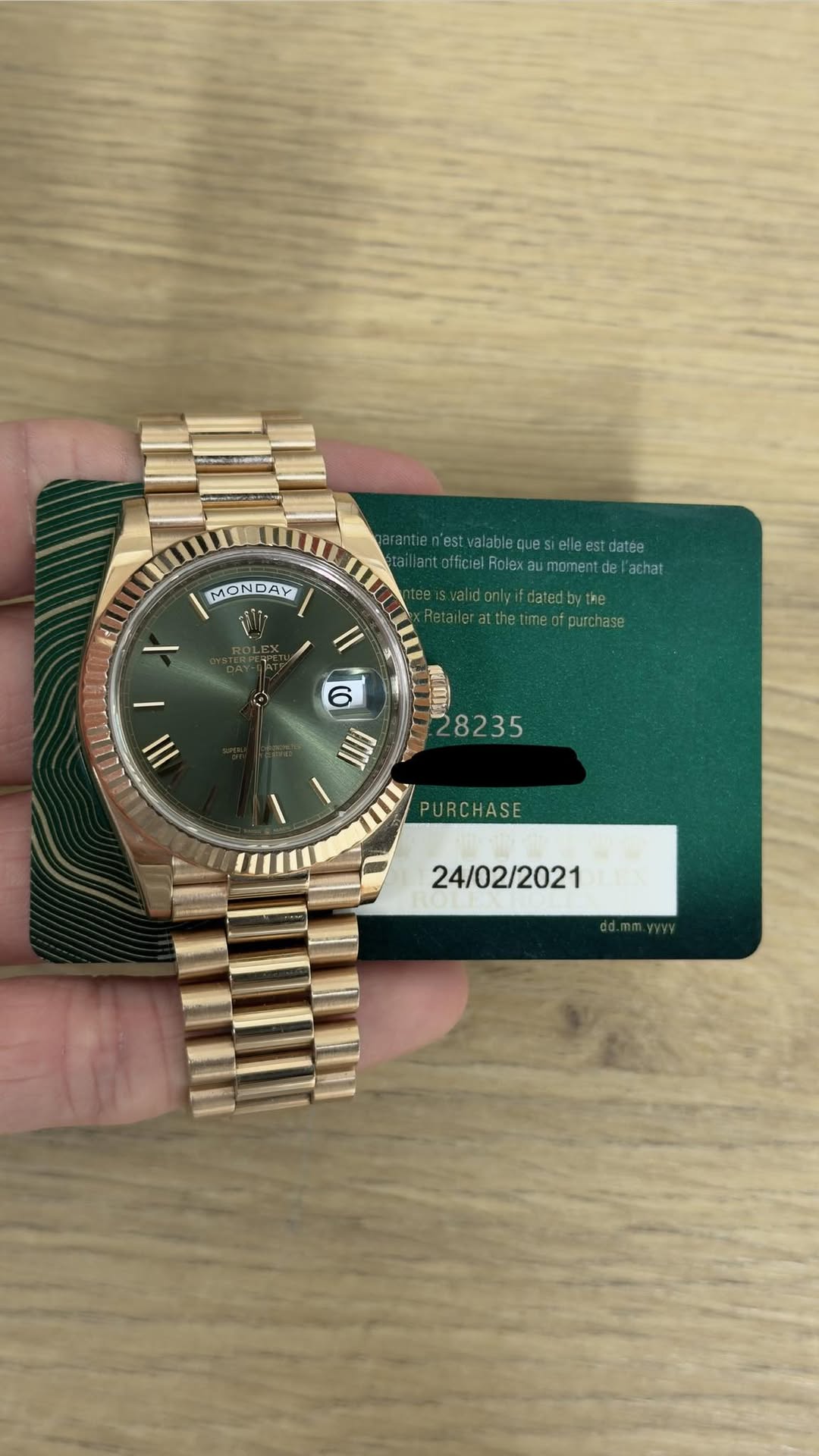 May be an image of wrist watch and text