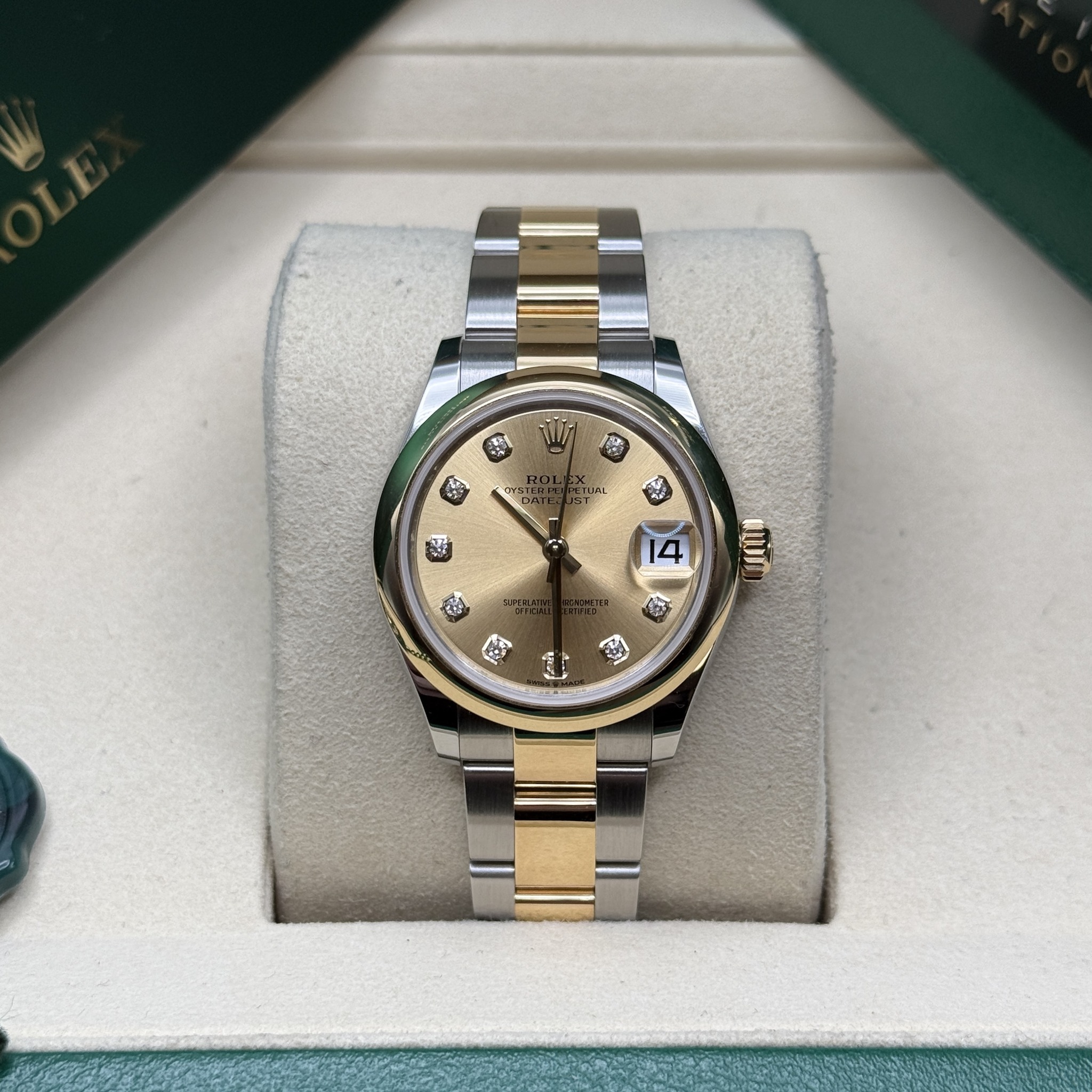 May be an image of wrist watch and text