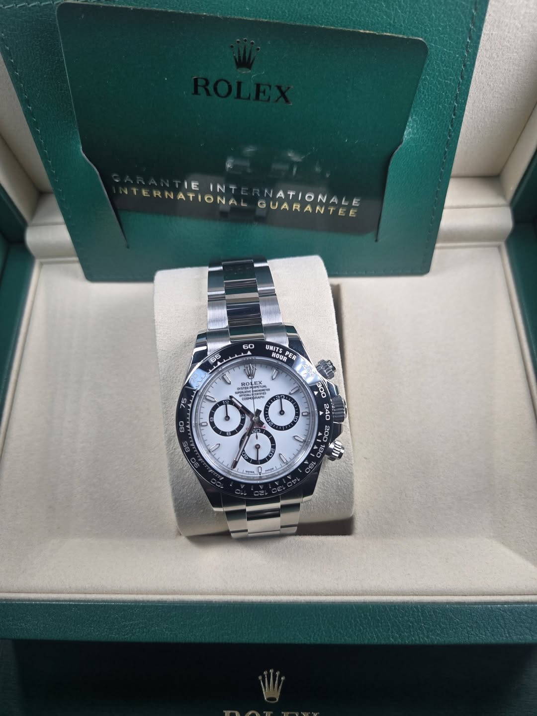 May be an image of wrist watch and text