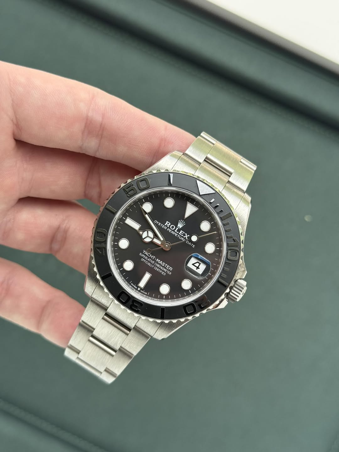 May be an image of wrist watch and text