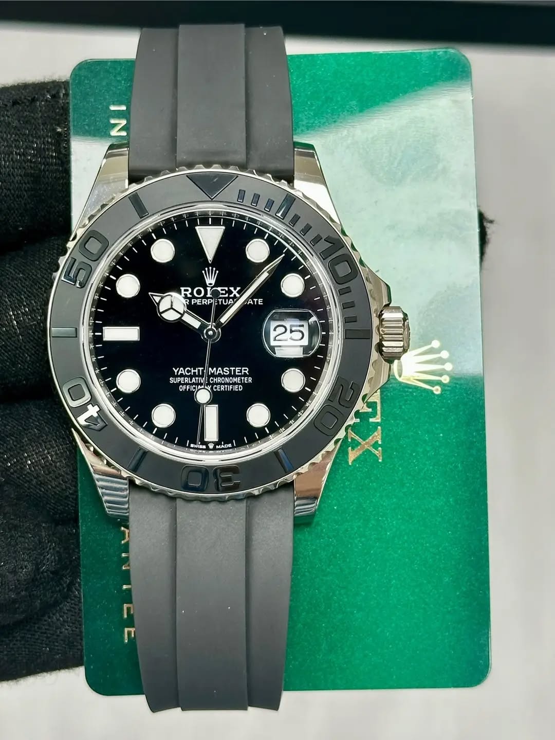 May be an image of wrist watch and text that says 'IN 50 5 O ROIEX TUA RO EX PERPI ATE 25 YACHT YACHTMASTER MASTER SUPERLATIV LATIMECHRONO UPERLATME CEOTRER HRONOMETER METER CERTIF…