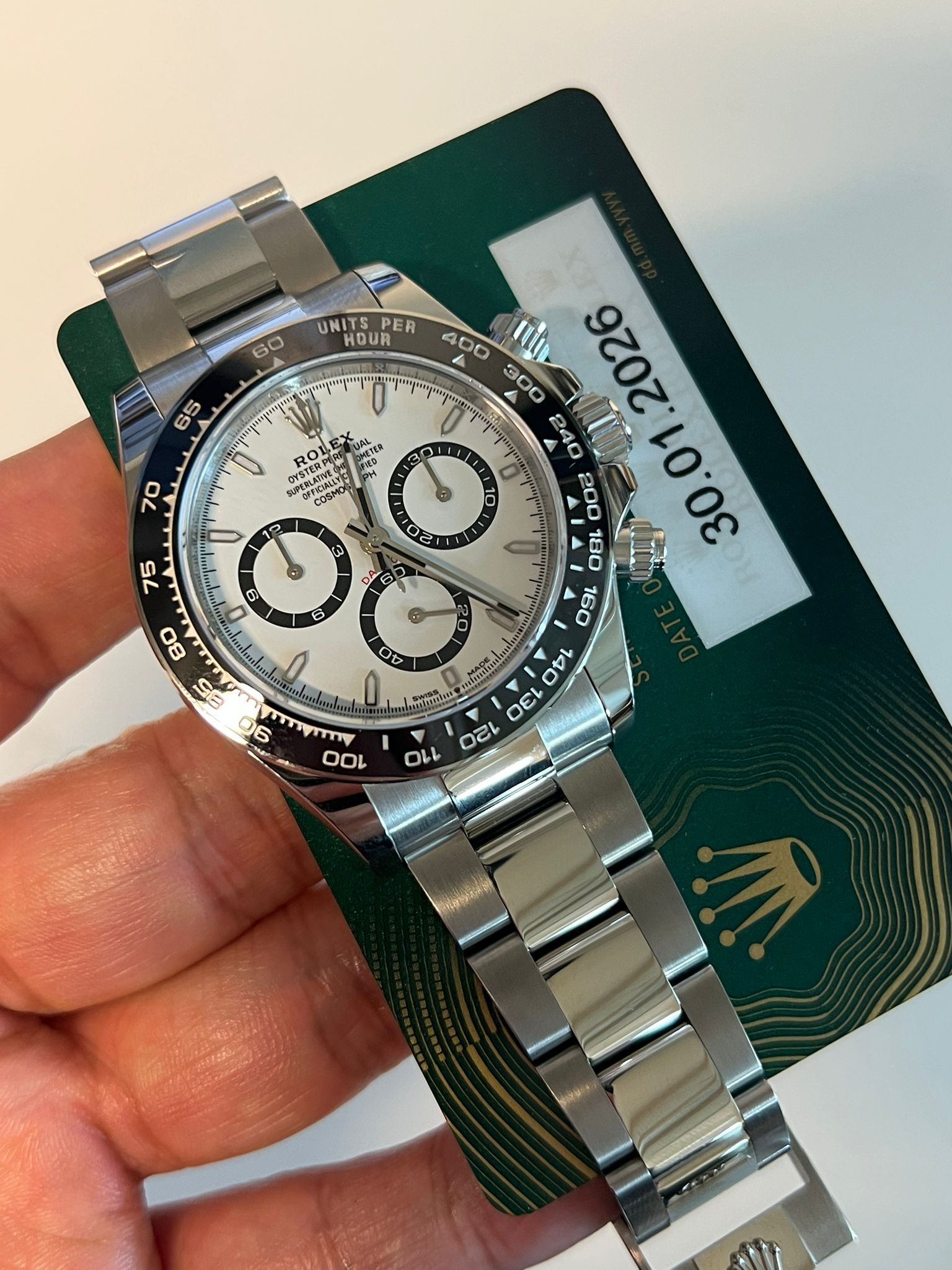 May be an image of wrist watch and text