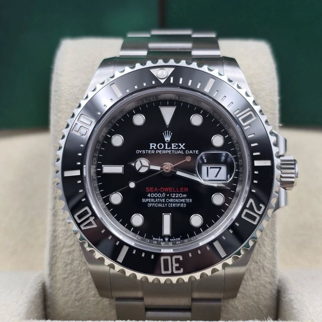 May be an image of wrist watch and text that says 'n a 50 u 10 ROLEX OYSTER PERPETUAL TUAL DATE 17 4000ft 1220m UPERLAT HRONOME CMETE OFFICIALLYCERTIFI CERTFIE SUPE Fie…